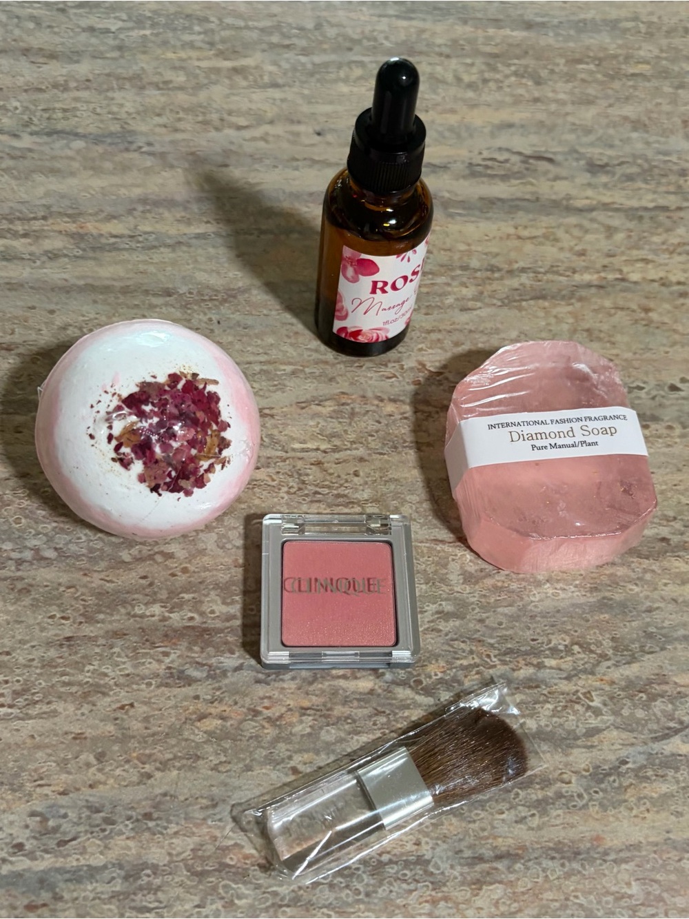 Clinique Pink Blush Powder & brush, Rose Massage oil, Diamond Soap, bath bomb